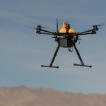 A drone is shown flying during a test of Unmanned Aircraft Systems Traffic Management (UTM) technical capability Level 2
